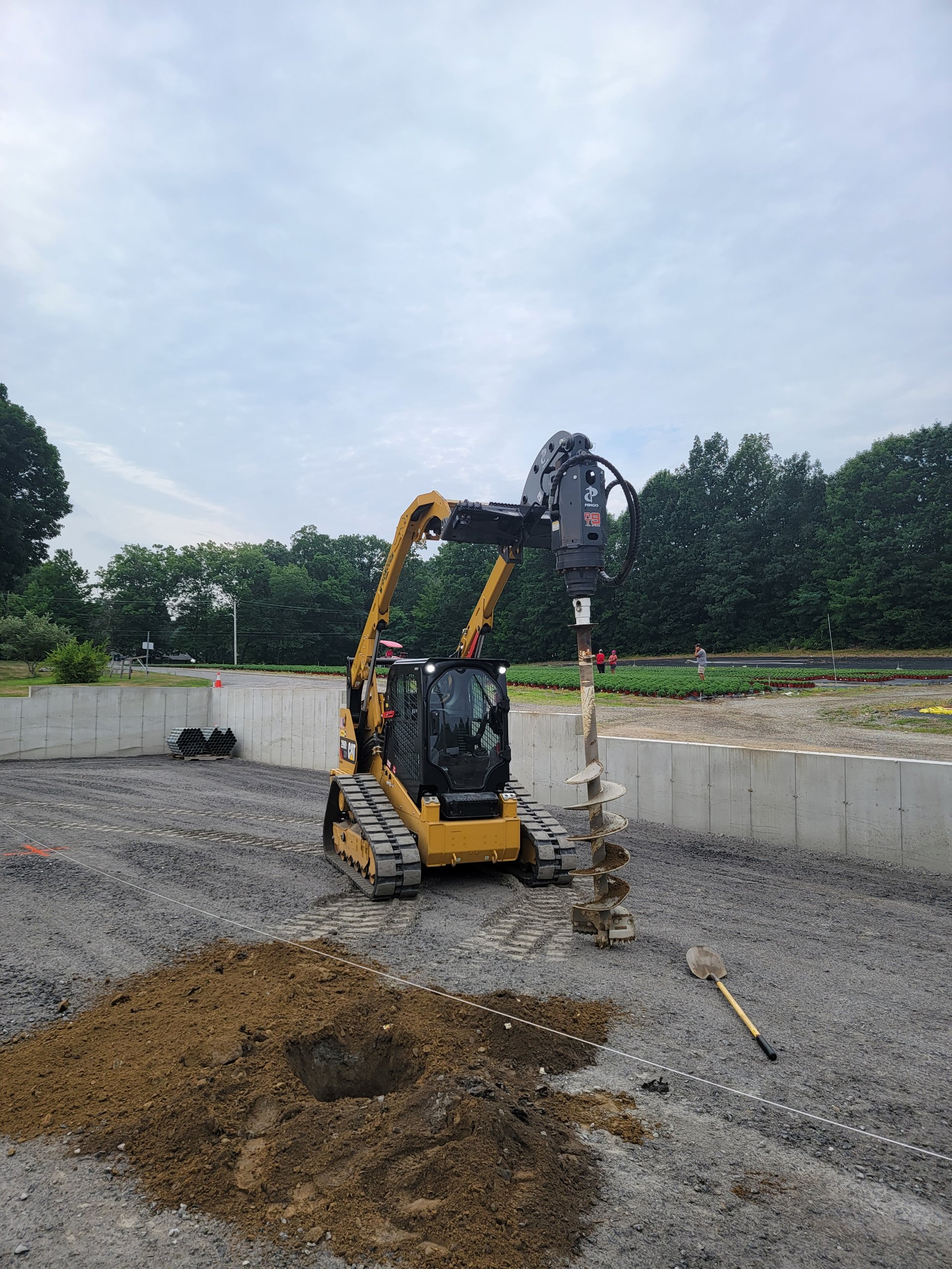 CAT 299D specialty pole setting — location 4