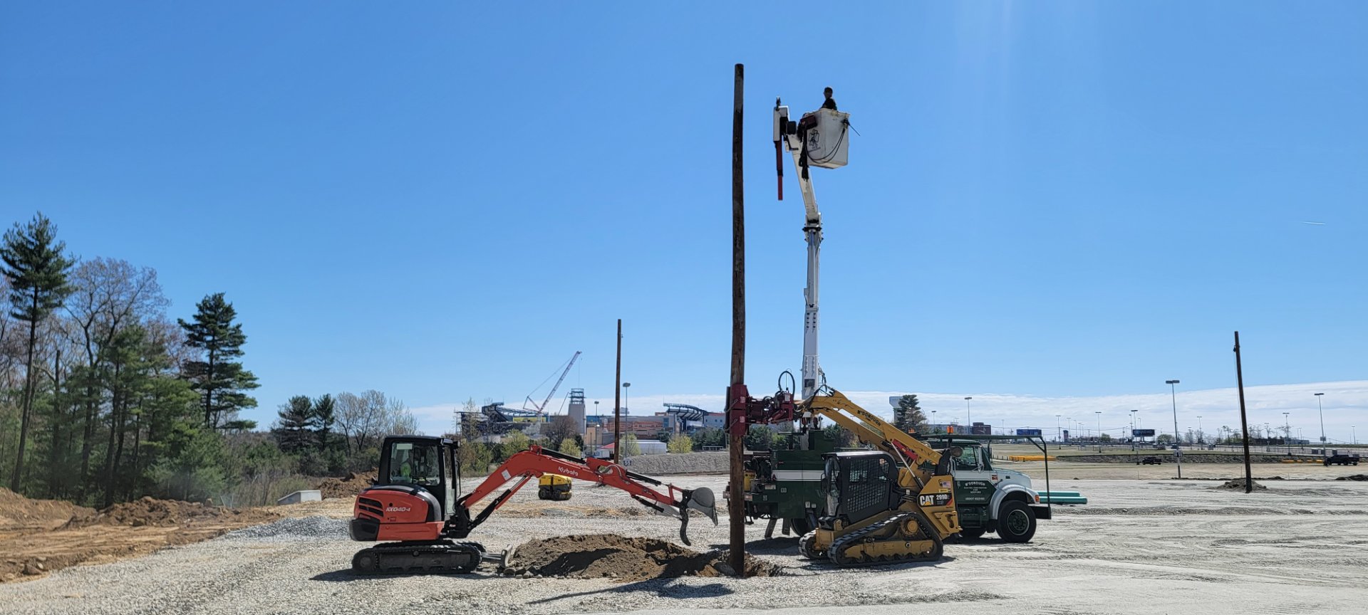 CAT 299D specialty pole setting — location 2